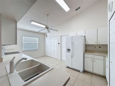 Great views of the city & golf course. Popular Canterbury model on Kings Ridge Golf Club in Florida - for sale on GolfHomes.com, golf home, golf lot