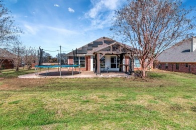 Discover this beautifully upgraded 3-bedroom, 2-bath home in the on Pecan Plantation Country Club in Texas - for sale on GolfHomes.com, golf home, golf lot