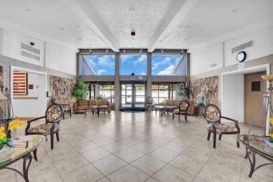 Step into effortless coastal elegance in this beautifully on Marina Lakes Golf Course in Florida - for sale on GolfHomes.com, golf home, golf lot