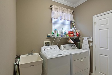 Discover ultimate privacy in this upgraded Jacaranda model on Waterlefe Golf and River Club in Florida - for sale on GolfHomes.com, golf home, golf lot