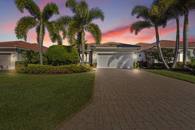 This meticulously maintained residence offers extensive updates on Santa Lucia River Club in Florida - for sale on GolfHomes.com, golf home, golf lot