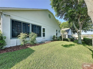 Great views of the city & golf course. Popular Canterbury model on Kings Ridge Golf Club in Florida - for sale on GolfHomes.com, golf home, golf lot