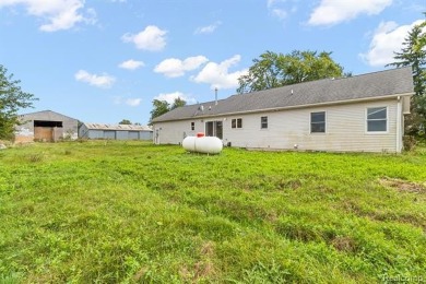 Welcome to your dream home in Melvin, Michigan! Nestled on 1.38 on Willow Tree Golf Course in Michigan - for sale on GolfHomes.com, golf home, golf lot