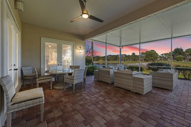This meticulously maintained residence offers extensive updates on Santa Lucia River Club in Florida - for sale on GolfHomes.com, golf home, golf lot
