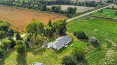 Welcome to your dream home in Melvin, Michigan! Nestled on 1.38 on Willow Tree Golf Course in Michigan - for sale on GolfHomes.com, golf home, golf lot