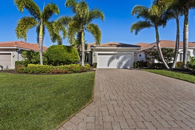 This meticulously maintained residence offers extensive updates on Santa Lucia River Club in Florida - for sale on GolfHomes.com, golf home, golf lot