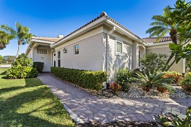This meticulously maintained residence offers extensive updates on Santa Lucia River Club in Florida - for sale on GolfHomes.com, golf home, golf lot