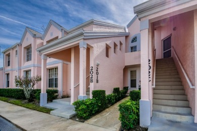 Enjoy the easy life in this first floor unit, mere steps away on The Golf Club of Jupiter in Florida - for sale on GolfHomes.com, golf home, golf lot