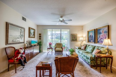 Enjoy the easy life in this first floor unit, mere steps away on The Golf Club of Jupiter in Florida - for sale on GolfHomes.com, golf home, golf lot