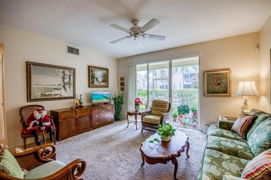 Enjoy the easy life in this first floor unit, mere steps away on The Golf Club of Jupiter in Florida - for sale on GolfHomes.com, golf home, golf lot