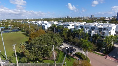 Experience elevated waterfront living in the heart of Miami on Normandy Shores Golf Course in Florida - for sale on GolfHomes.com, golf home, golf lot