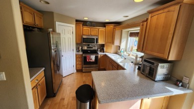 Location, location,location! This property backs up to a mature on Western Lakes Golf Club in Wisconsin - for sale on GolfHomes.com, golf home, golf lot