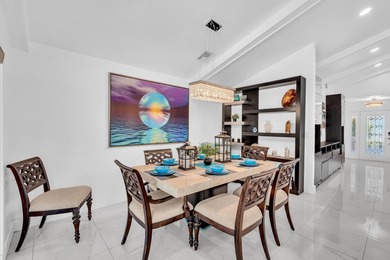 Beautifully renovated one story home featuring a modern open on Boca Greens Country Club in Florida - for sale on GolfHomes.com, golf home, golf lot