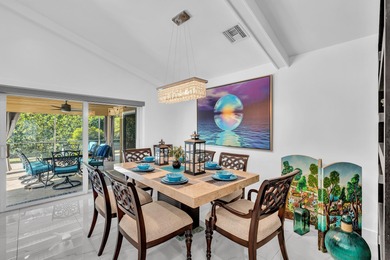 Beautifully renovated one story home featuring a modern open on Boca Greens Country Club in Florida - for sale on GolfHomes.com, golf home, golf lot