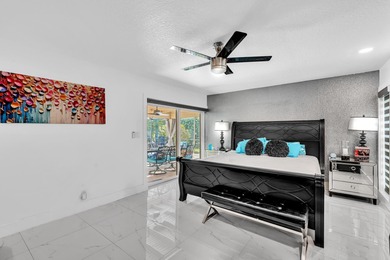 Beautifully renovated one story home featuring a modern open on Boca Greens Country Club in Florida - for sale on GolfHomes.com, golf home, golf lot