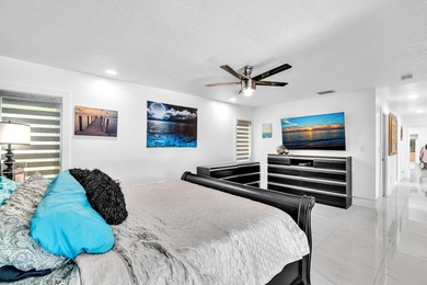 Beautifully renovated one story home featuring a modern open on Boca Greens Country Club in Florida - for sale on GolfHomes.com, golf home, golf lot