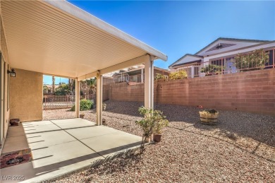 Nestled in the coveted Sun City MacDonald Ranch golf course on Desert Willow Golf Course in Nevada - for sale on GolfHomes.com, golf home, golf lot