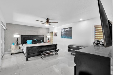 Beautifully renovated one story home featuring a modern open on Boca Greens Country Club in Florida - for sale on GolfHomes.com, golf home, golf lot