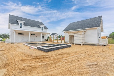 This new home built by Cole Construction is the popular Rose on Origins Golf Club in Florida - for sale on GolfHomes.com, golf home, golf lot