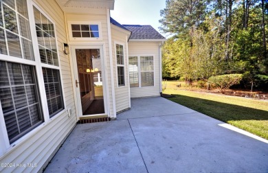 This home truly has it all -comfort, style and a prime location on Sandpiper Bay Golf and Country Club in North Carolina - for sale on GolfHomes.com, golf home, golf lot