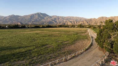 The *Gem of the Desert*, set on 40 acres in the heart of La on The Madison Club in California - for sale on GolfHomes.com, golf home, golf lot