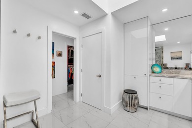 Beautifully renovated one story home featuring a modern open on Boca Greens Country Club in Florida - for sale on GolfHomes.com, golf home, golf lot