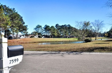 This home truly has it all -comfort, style and a prime location on Sandpiper Bay Golf and Country Club in North Carolina - for sale on GolfHomes.com, golf home, golf lot