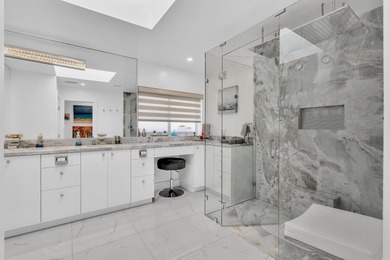 Beautifully renovated one story home featuring a modern open on Boca Greens Country Club in Florida - for sale on GolfHomes.com, golf home, golf lot