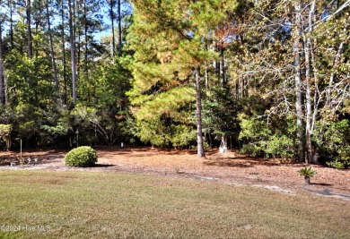 This home truly has it all -comfort, style and a prime location on Sandpiper Bay Golf and Country Club in North Carolina - for sale on GolfHomes.com, golf home, golf lot