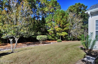 This home truly has it all -comfort, style and a prime location on Sandpiper Bay Golf and Country Club in North Carolina - for sale on GolfHomes.com, golf home, golf lot