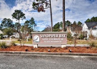 This home truly has it all -comfort, style and a prime location on Sandpiper Bay Golf and Country Club in North Carolina - for sale on GolfHomes.com, golf home, golf lot