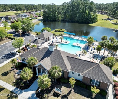 This home truly has it all -comfort, style and a prime location on Sandpiper Bay Golf and Country Club in North Carolina - for sale on GolfHomes.com, golf home, golf lot