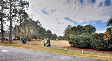 This home truly has it all -comfort, style and a prime location on Sandpiper Bay Golf and Country Club in North Carolina - for sale on GolfHomes.com, golf home, golf lot