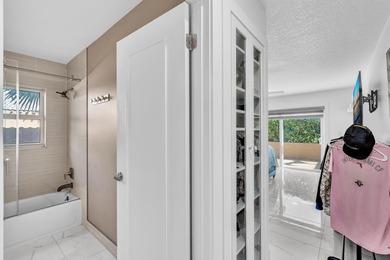 Beautifully renovated one story home featuring a modern open on Boca Greens Country Club in Florida - for sale on GolfHomes.com, golf home, golf lot