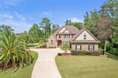 Located in the gated Oak Grove Island community, 104 Majestic on Oak Grove Island Golf and Country Club in Georgia - for sale on GolfHomes.com, golf home, golf lot
