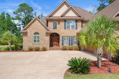 Located in the gated Oak Grove Island community, 104 Majestic on Oak Grove Island Golf and Country Club in Georgia - for sale on GolfHomes.com, golf home, golf lot