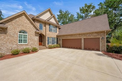 Located in the gated Oak Grove Island community, 104 Majestic on Oak Grove Island Golf and Country Club in Georgia - for sale on GolfHomes.com, golf home, golf lot