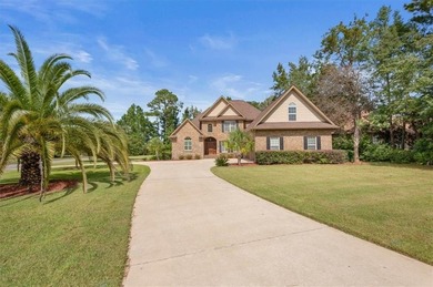 Located in the gated Oak Grove Island community, 104 Majestic on Oak Grove Island Golf and Country Club in Georgia - for sale on GolfHomes.com, golf home, golf lot