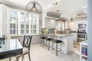 This top floor end unit apartment has been tastefully updated on Grand Harbor Golf and Country Club in Florida - for sale on GolfHomes.com, golf home, golf lot