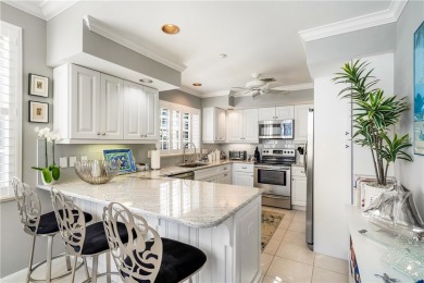 This top floor end unit apartment has been tastefully updated on Grand Harbor Golf and Country Club in Florida - for sale on GolfHomes.com, golf home, golf lot