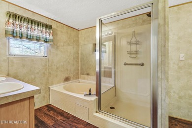 Well-kept and affordable 3 bedroom/ 2 bath manufactured home on on Stonehenge Golf Course in Tennessee - for sale on GolfHomes.com, golf home, golf lot