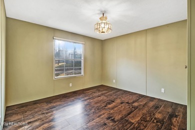 Well-kept and affordable 3 bedroom/ 2 bath manufactured home on on Stonehenge Golf Course in Tennessee - for sale on GolfHomes.com, golf home, golf lot