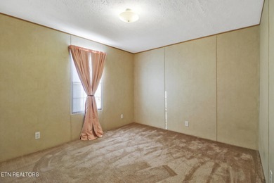 Well-kept and affordable 3 bedroom/ 2 bath manufactured home on on Stonehenge Golf Course in Tennessee - for sale on GolfHomes.com, golf home, golf lot