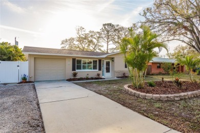 Under contract-accepting backup offers. PRICE ADJUSTMENT on The Dunedin Country Club in Florida - for sale on GolfHomes.com, golf home, golf lot