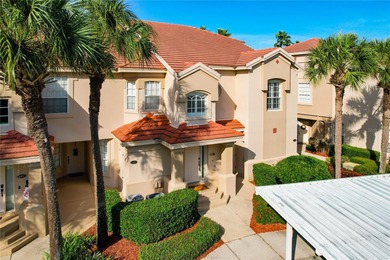 This absolutely stunning, maintenance-free end-unit condo in the on Grasslands Golf and Country Club in Florida - for sale on GolfHomes.com, golf home, golf lot