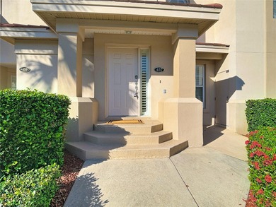 This absolutely stunning, maintenance-free end-unit condo in the on Grasslands Golf and Country Club in Florida - for sale on GolfHomes.com, golf home, golf lot