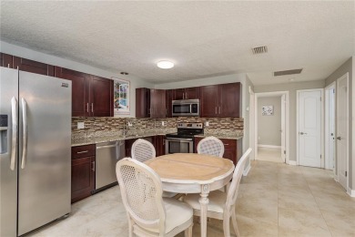 Under contract-accepting backup offers. PRICE ADJUSTMENT on The Dunedin Country Club in Florida - for sale on GolfHomes.com, golf home, golf lot