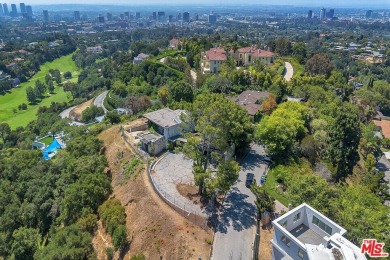 180 degree VIEWS of the mountains, city and ocean! Ideally on Bel-Air Country Club in California - for sale on GolfHomes.com, golf home, golf lot