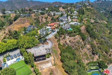 180 degree VIEWS of the mountains, city and ocean! Ideally on Bel-Air Country Club in California - for sale on GolfHomes.com, golf home, golf lot