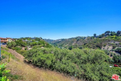 180 degree VIEWS of the mountains, city and ocean! Ideally on Bel-Air Country Club in California - for sale on GolfHomes.com, golf home, golf lot